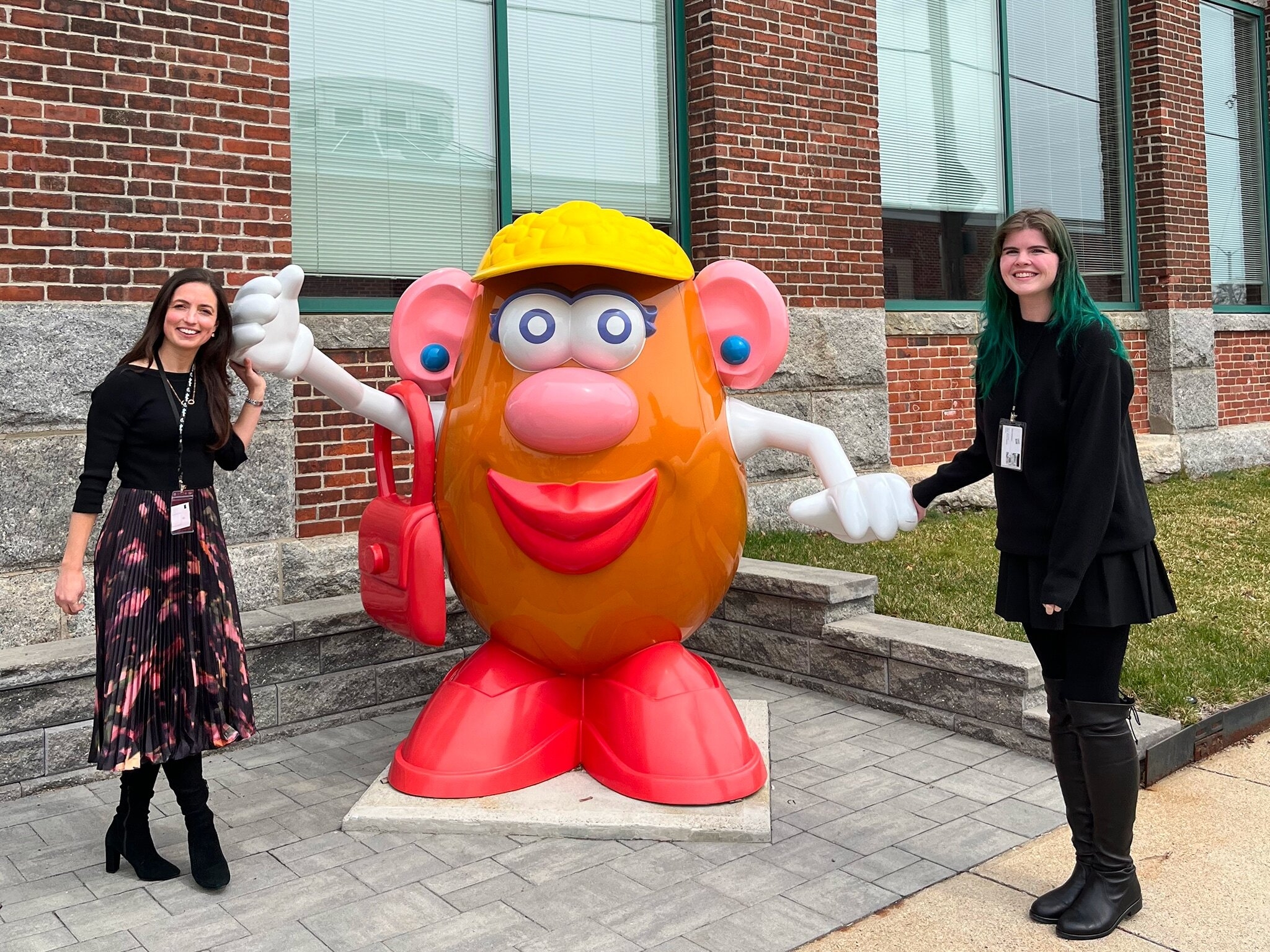 women innovators of play winners standing with Mr Potato Head