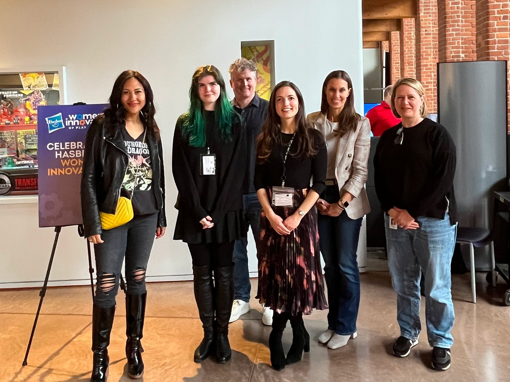 women innovators of play winners standing with Mr Potato Head