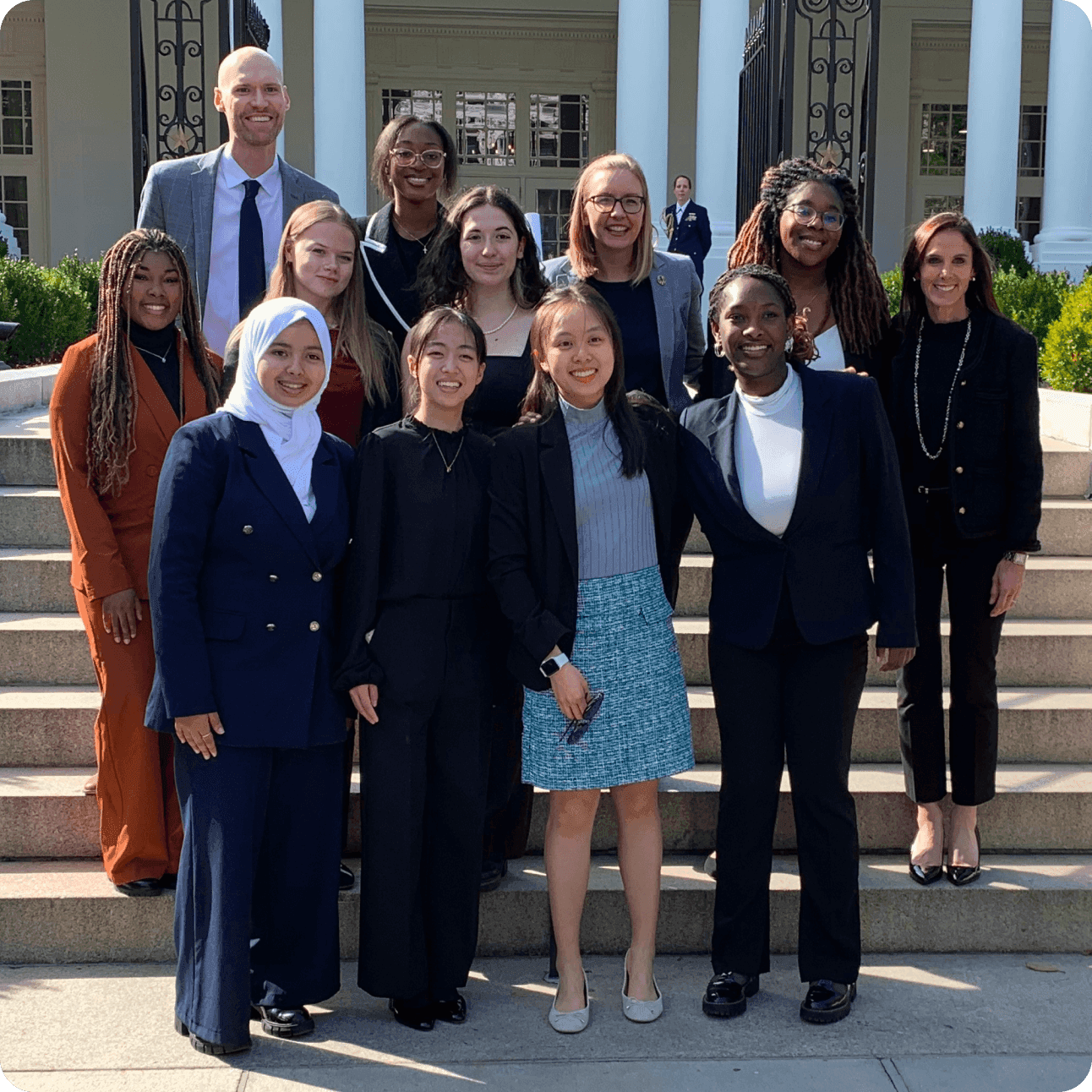 women innovators of play winners standing with Mr Potato Head